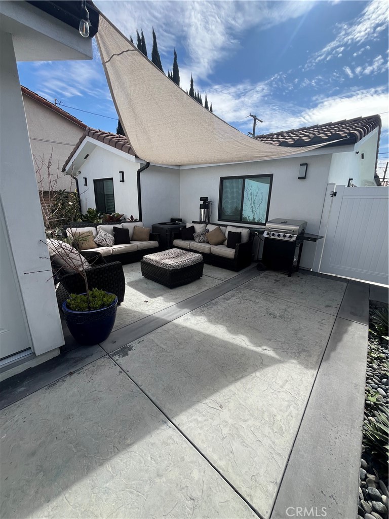 7274 Century Paramount, CA 90723 - Photo 11 of 11 a view of a patio with furniture