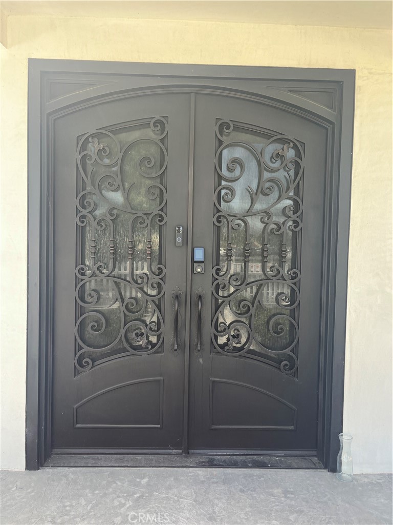 7274 Century Paramount, CA 90723 - Photo 2 of 11 a front view of a door