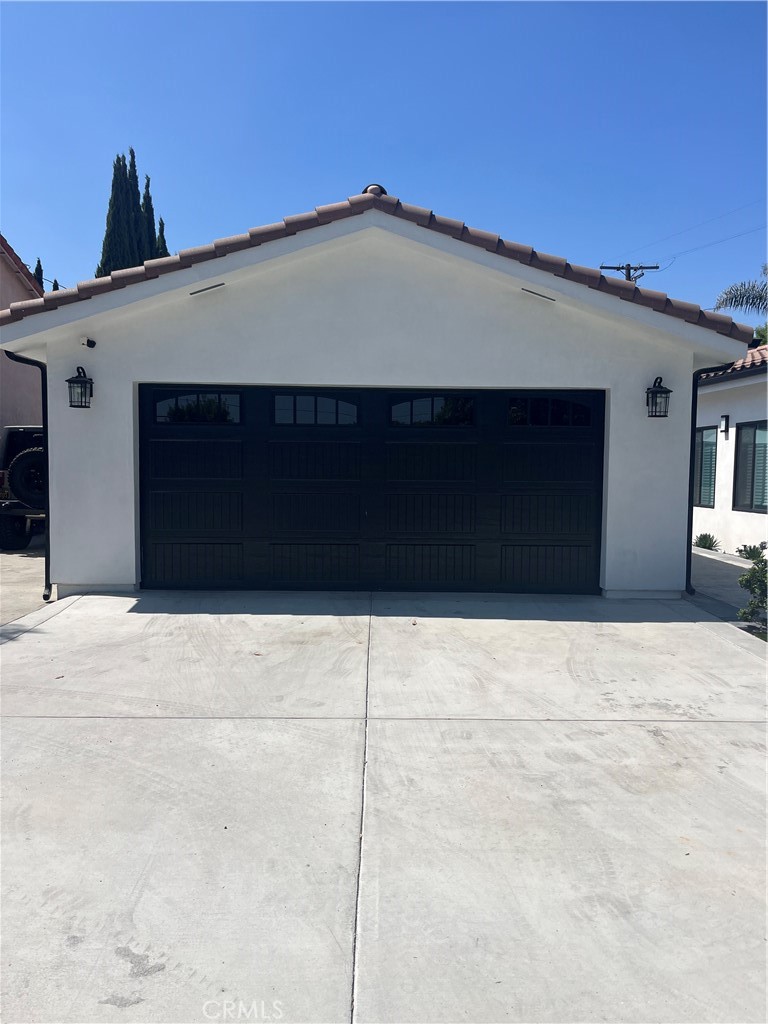 7274 Century Paramount, CA 90723 - Photo 7 of 11 a front view of a house