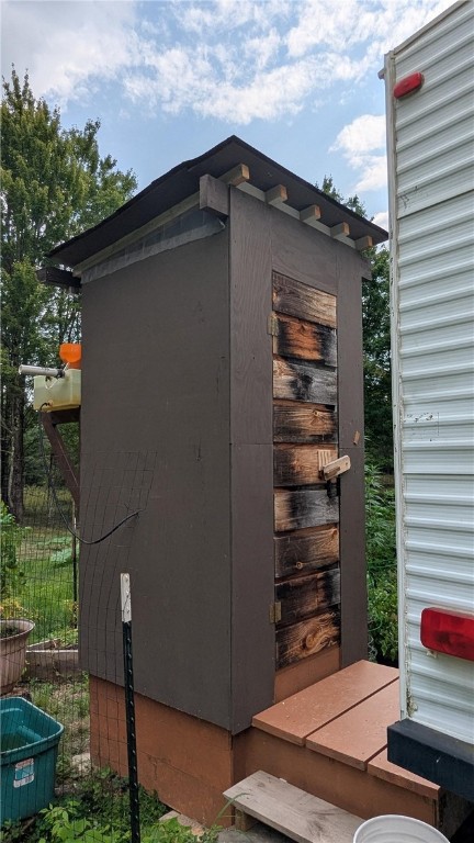 12-2-11 Wood Road Jefferson, NY 12093 - Photo 11 of 42 Outhouse with flush toilet