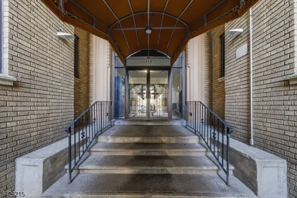 a view of entryway with a front door