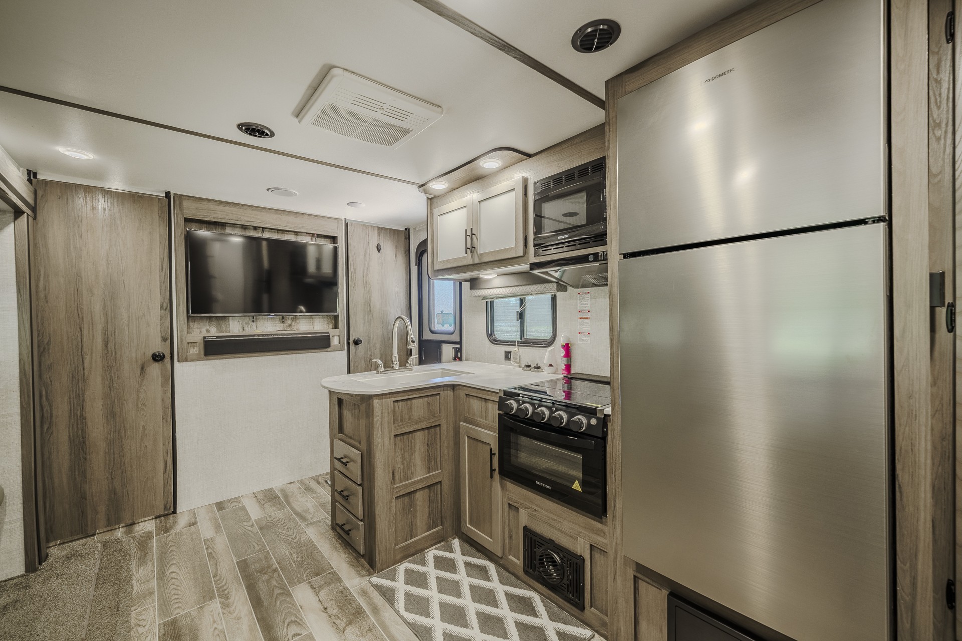 1082 WC PICKETT Road Clifton, TN 38425 - Photo 63 of 75 a kitchen with stainless steel appliances a refrigerator and a stove top oven