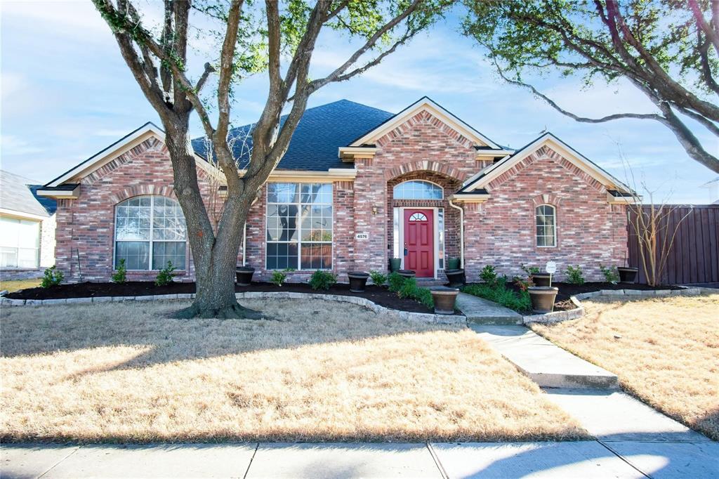 front view of house with a yard