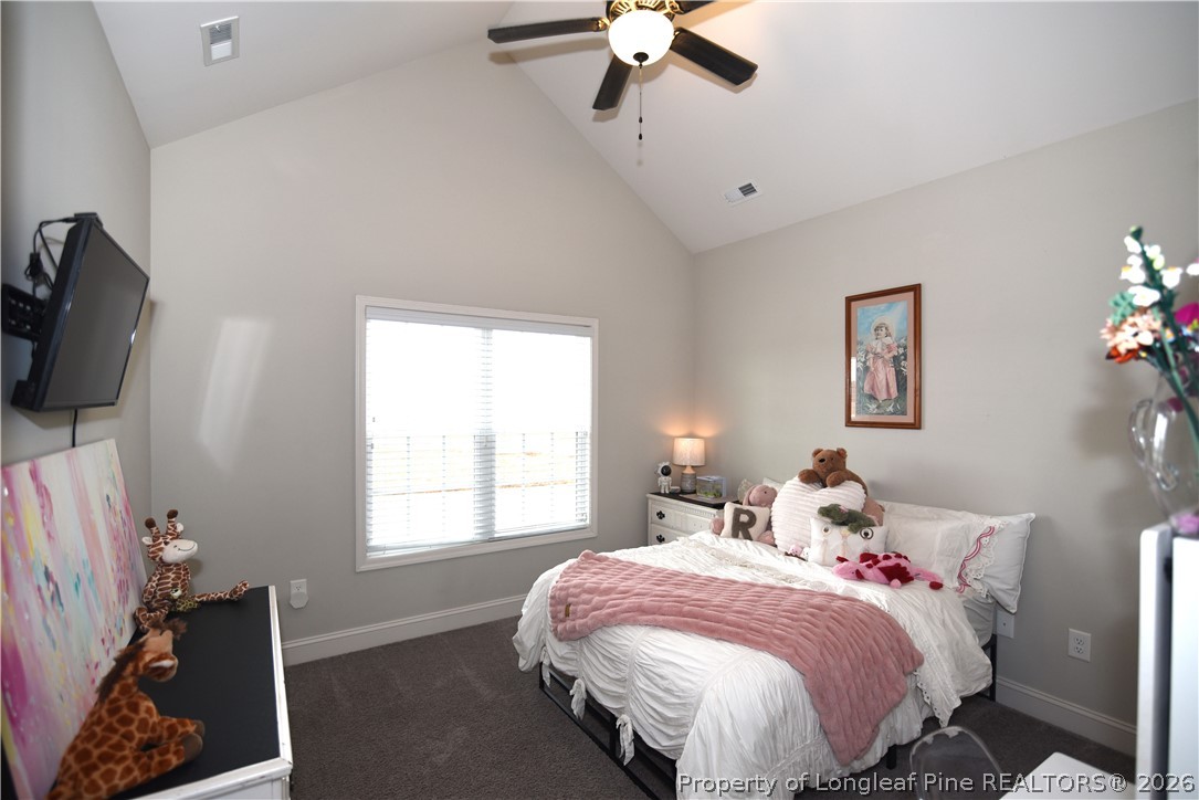1843 Meadow Road Lumberton, NC 28358 - Photo 21 of 35 a bedroom with bed and window