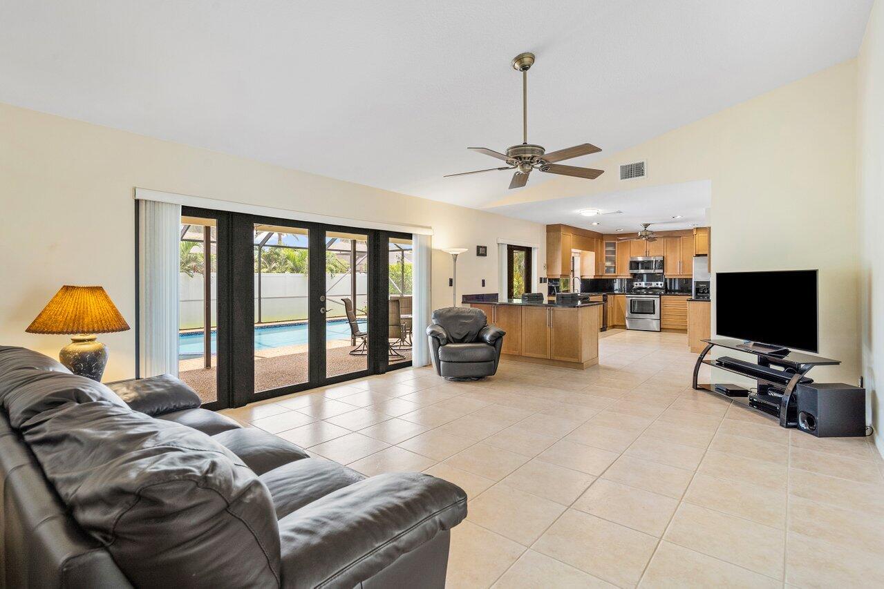 20946 Raindance Lane Boca Raton, FL 33428 - Photo 11 of 43 Family Room and Kitchen