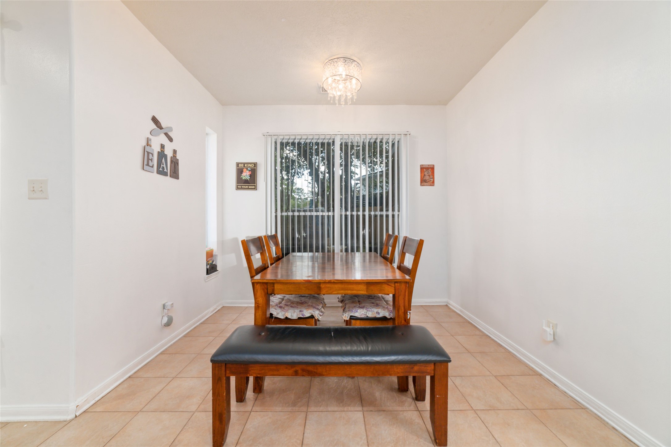9003 Memorial Hills Drive Spring, TX 77379 - Photo 22 of 39 a dining room with furniture and window