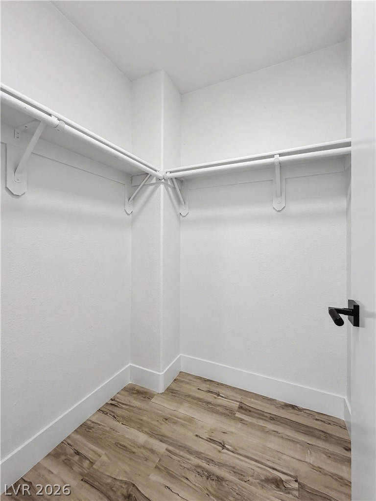 8977 Paige Rene Court Las Vegas, NV 89117 - Photo 31 of 31 Functional organization awaits in this ample closet, ready to store your wardrobe with ease.