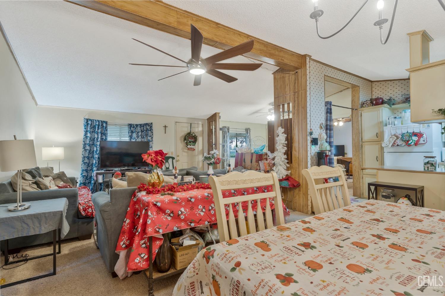 Undisclosed Address Bakersfield, CA 93306 - Photo 12 of 26 a bedroom with a bed and wooden floor