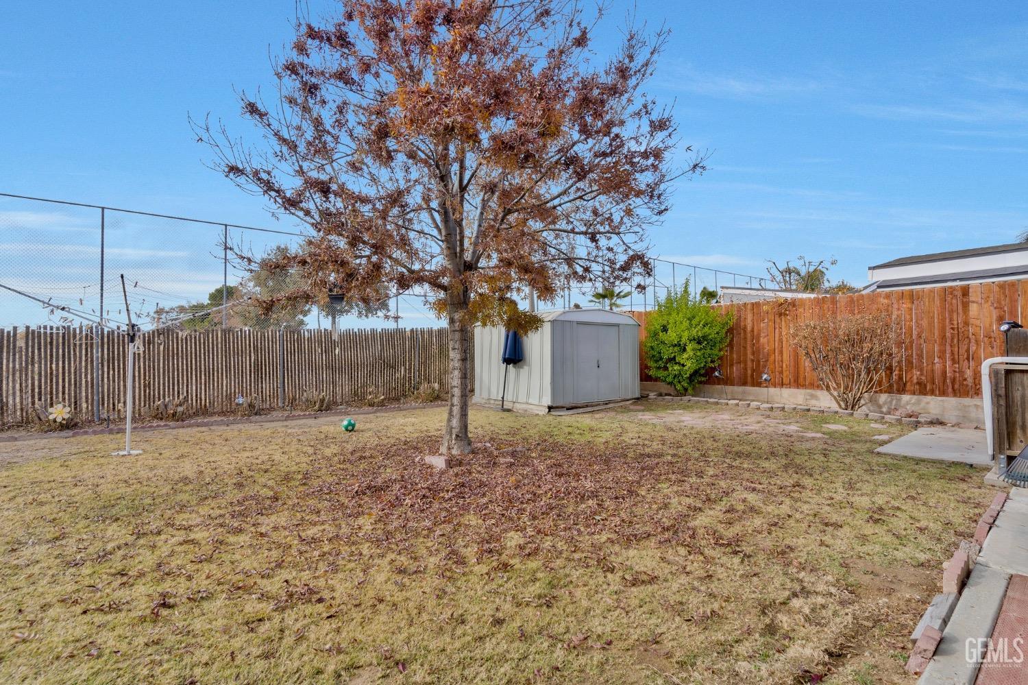 Undisclosed Address Bakersfield, CA 93306 - Photo 24 of 26 a backyard of a house