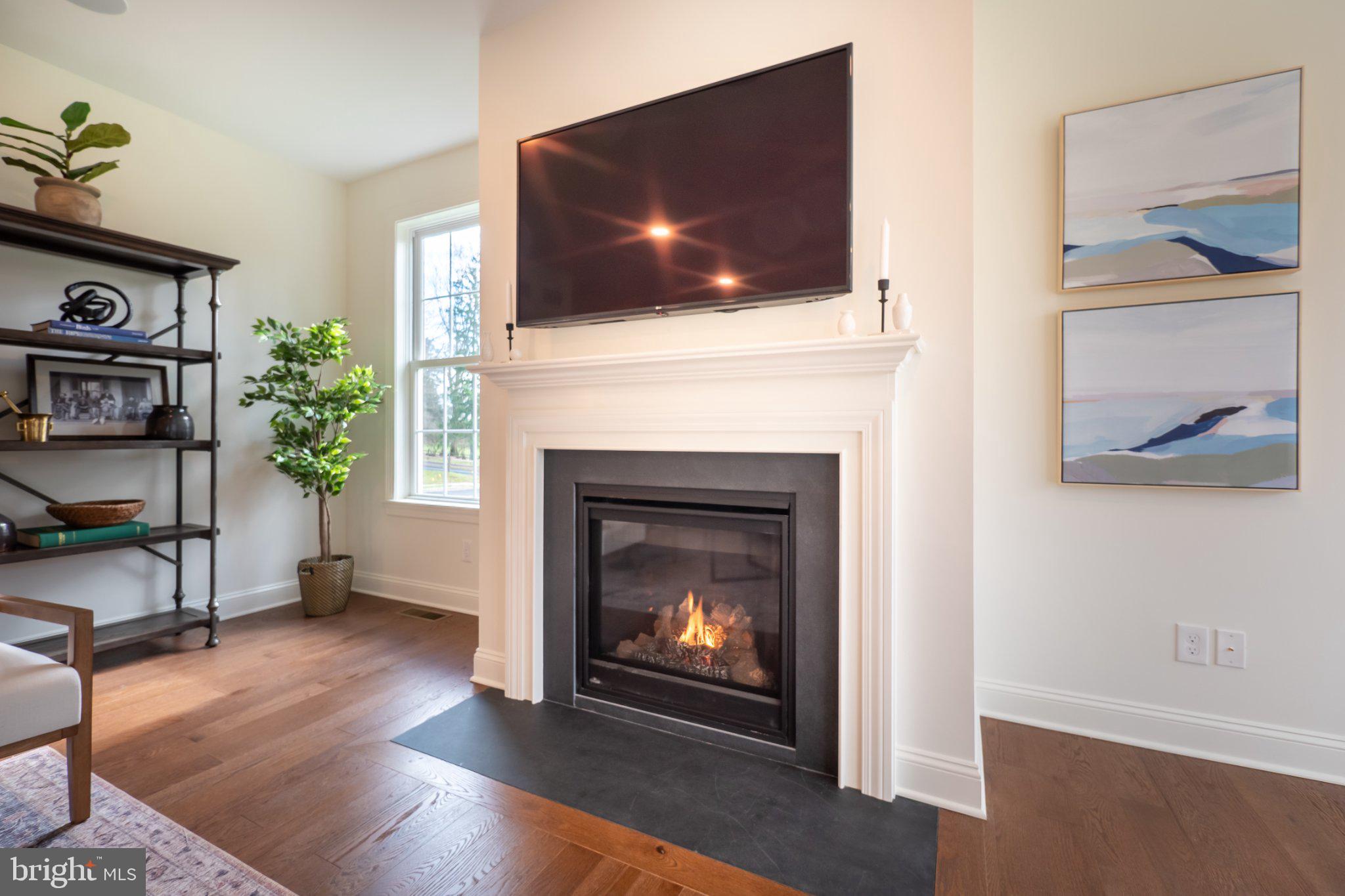 4630 Old Saucon Road Bethlehem, PA 18015 - Photo 13 of 33 a living room with furniture and a fireplace