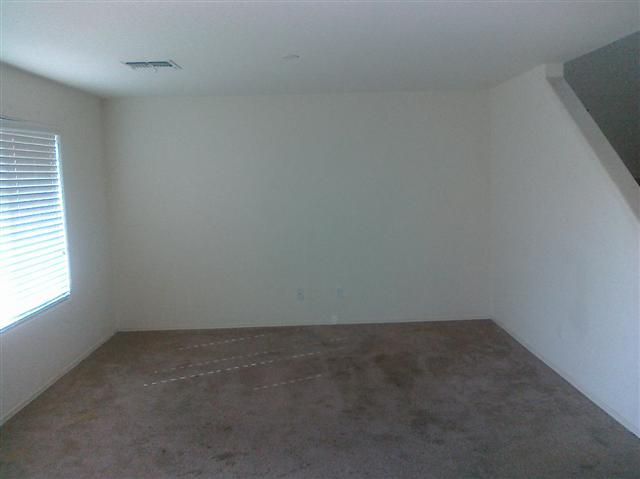 9141 West Payson Road Tolleson, AZ 85353 - Photo 3 of 13 family room off kitchen