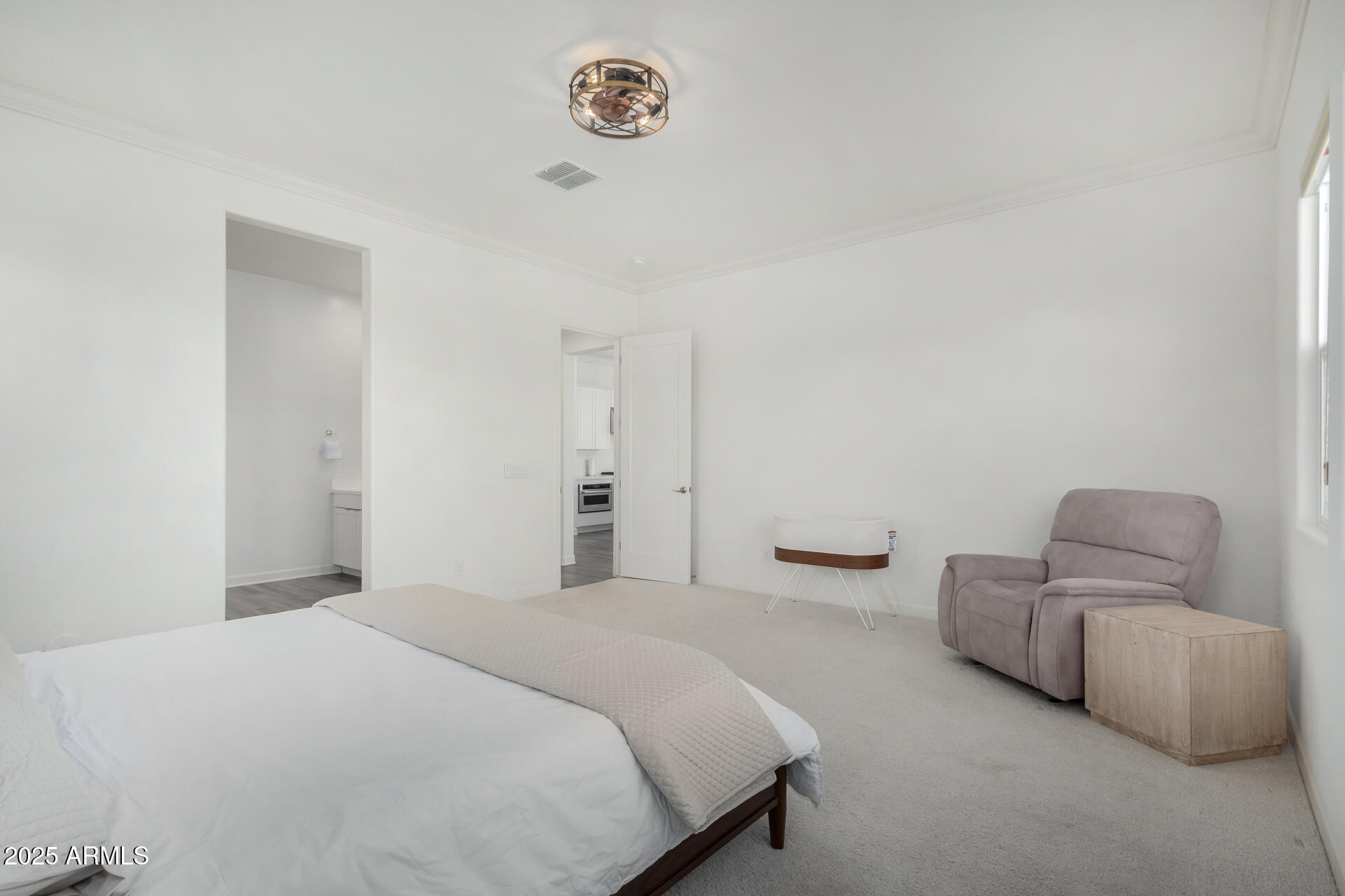 11048 East Utah Avenue Mesa, AZ 85212 - Photo 11 of 29 a bedroom with bed and a couch