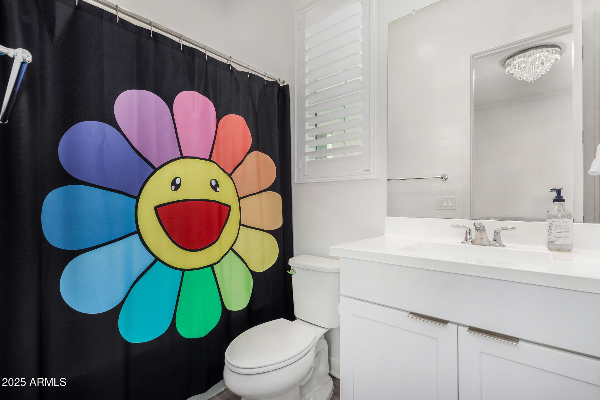 11048 East Utah Avenue Mesa, AZ 85212 - Photo 23 of 29 a bathroom with a toilet and a sink