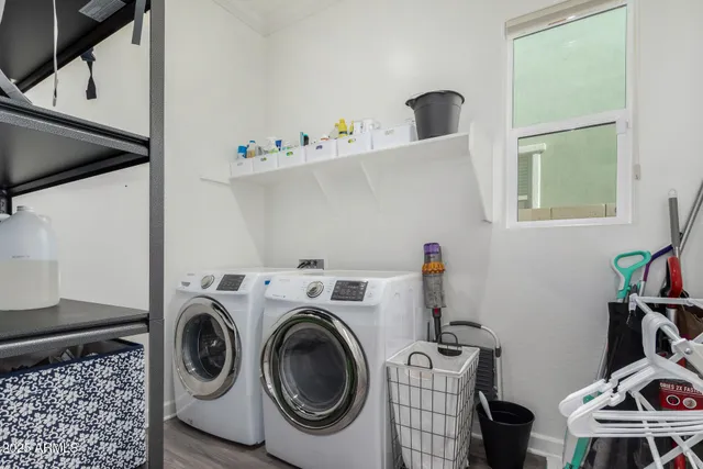 a utility room with dryer and washer