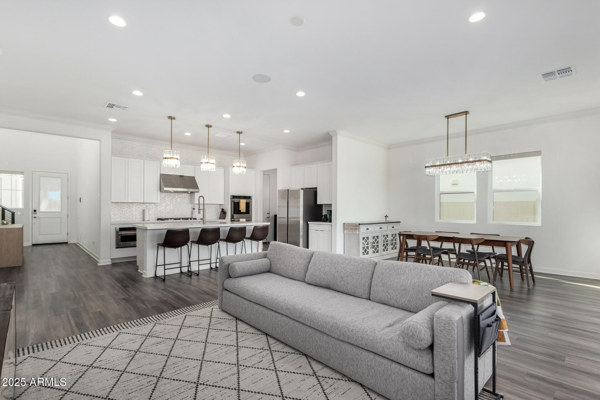 11048 East Utah Avenue Mesa, AZ 85212 - Photo 4 of 29 a living room with furniture and kitchen view