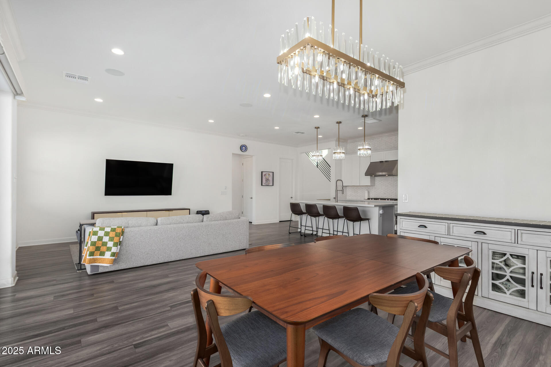 11048 East Utah Avenue Mesa, AZ 85212 - Photo 6 of 29 a view of a dining room with furniture and wooden floor