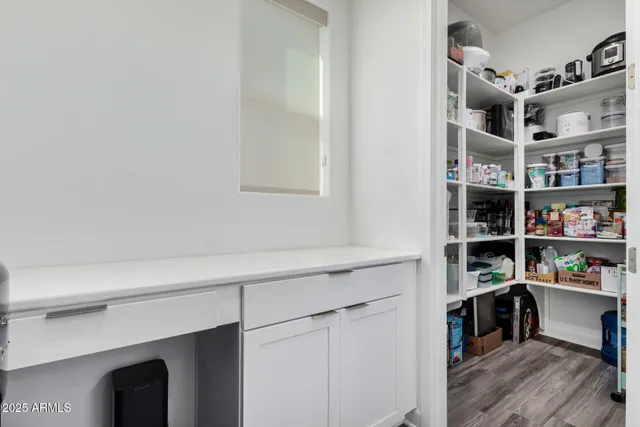 a room with a book shelf