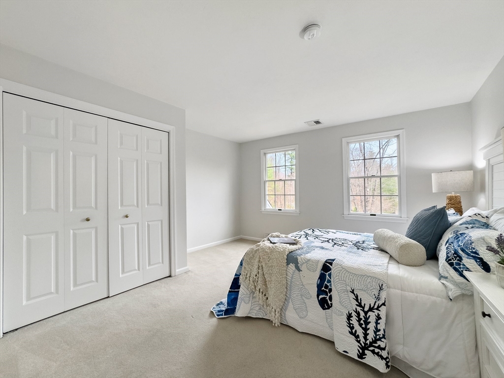 60 Golden Run Road Bolton, MA 01740 - Photo 24 of 42 a bedroom with a bed and a window