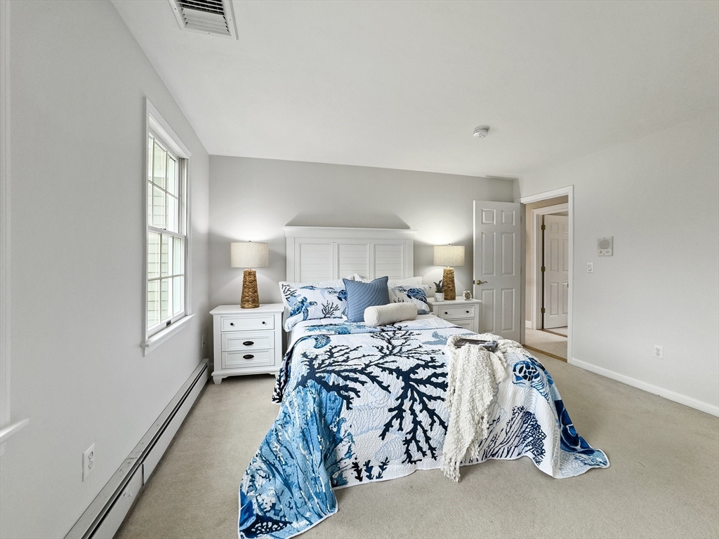 60 Golden Run Road Bolton, MA 01740 - Photo 25 of 42 a bed room with furniture and a large window