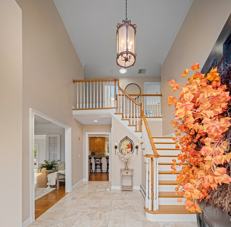 60 Golden Run Road Bolton, MA 01740 - Photo 3 of 42 a view of entryway and hall with wooden floor