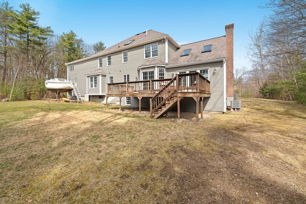 60 Golden Run Road Bolton, MA 01740 - Photo 36 of 42 a view of a house with wooden fence