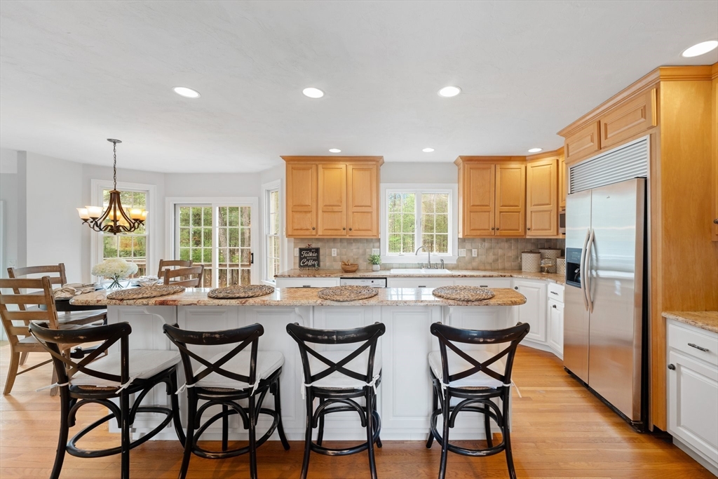 60 Golden Run Road Bolton, MA 01740 - Photo 9 of 42 a view of a dining room with furniture and window
