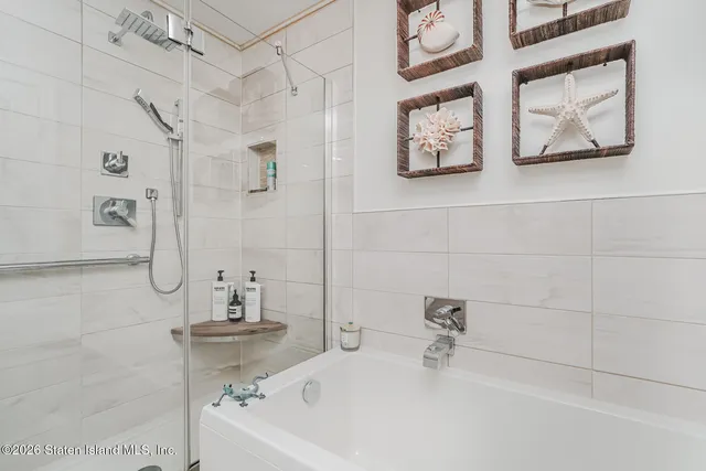 a view of a two chairs in the patio