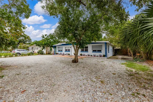 front view of a house with a trees