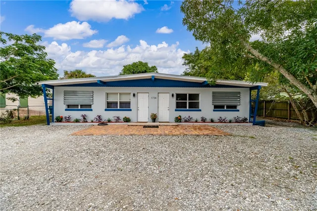 front view of a house with a patio
