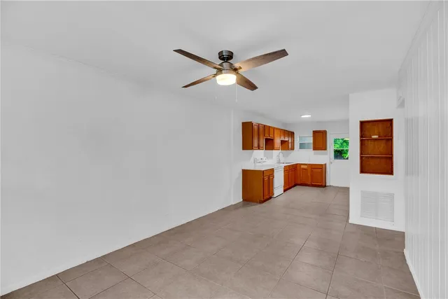 a view of a livingroom with a kitchen