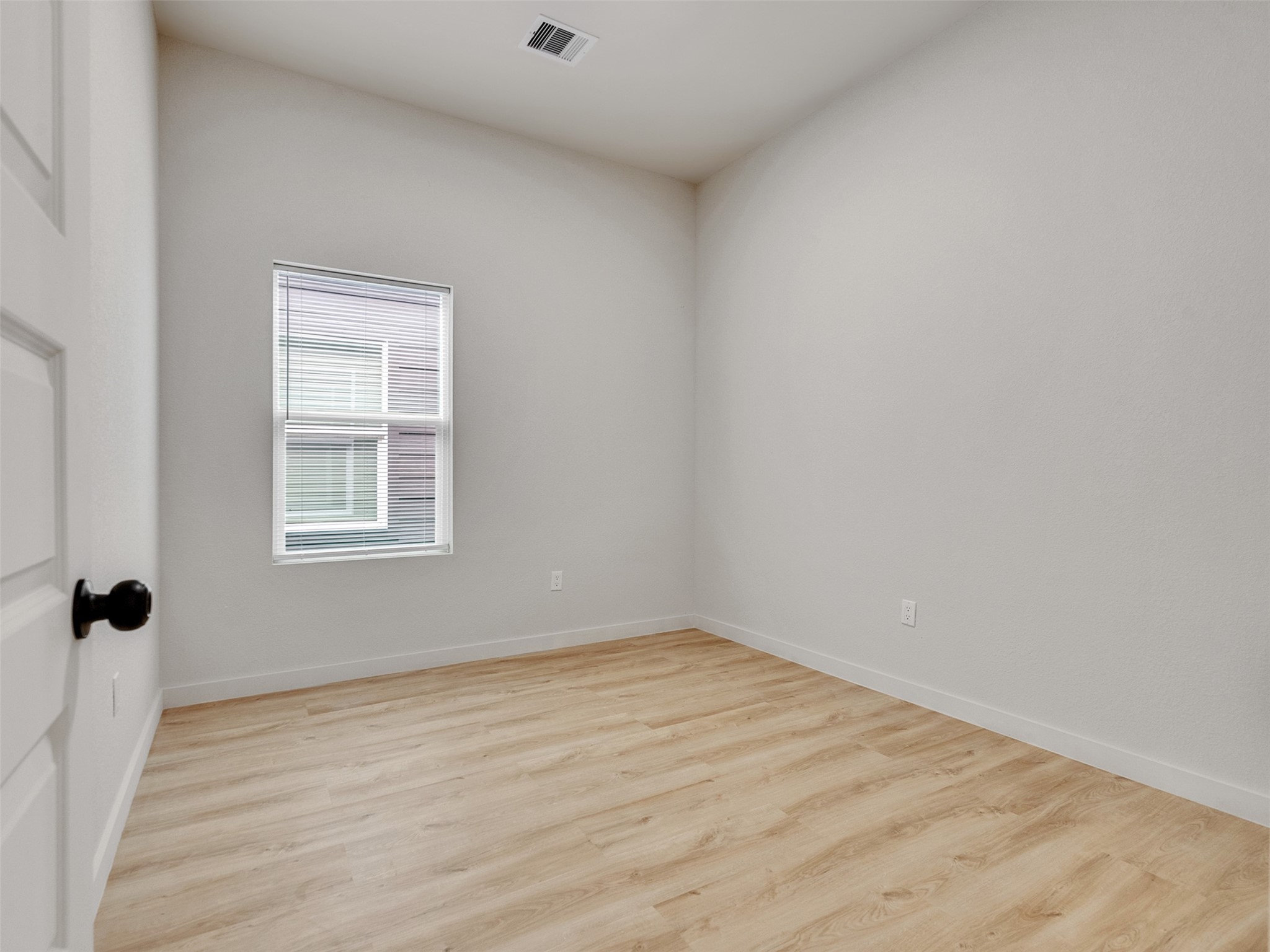 9707 Cargill Street, Unit AB Houston, TX 77029 - Photo 19 of 32 wooden floor in an empty room