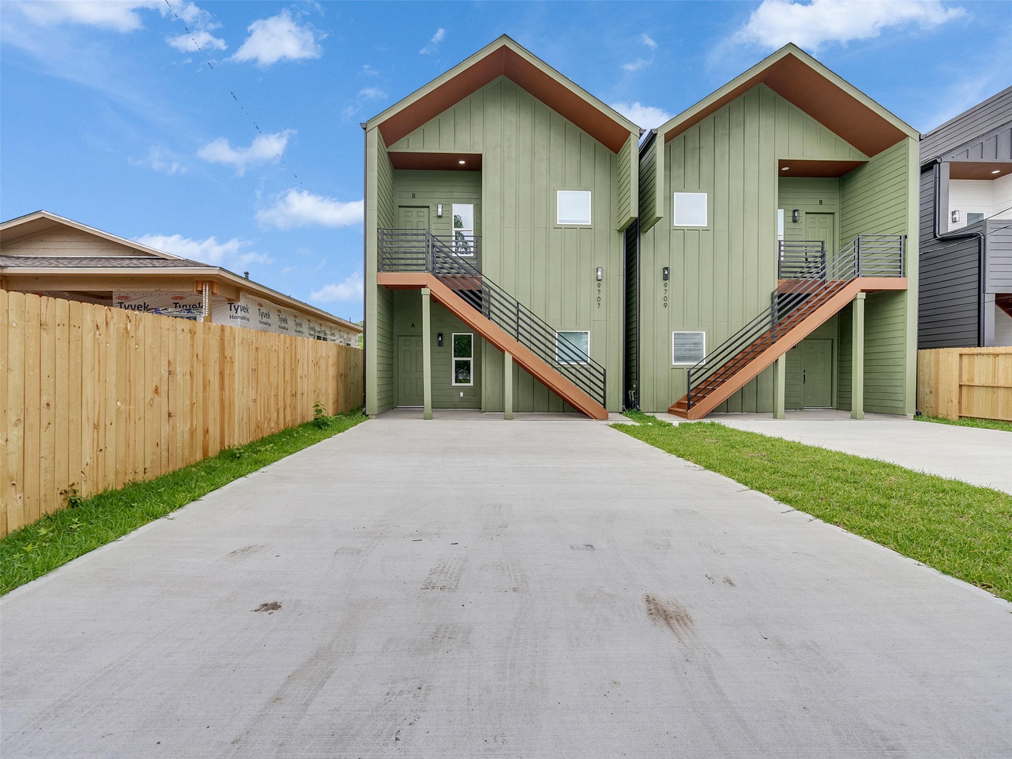 9707 Cargill Street, Unit AB Houston, TX 77029 - Photo 29 of 32 a view of an house with backyard and road