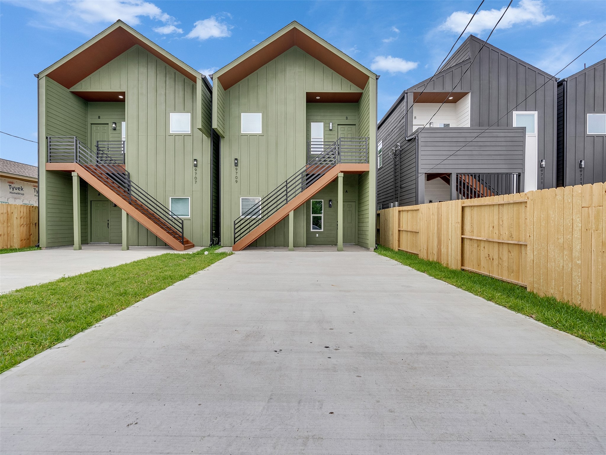 9707 Cargill Street, Unit AB Houston, TX 77029 - Photo 30 of 32 a view of an house with backyard and road