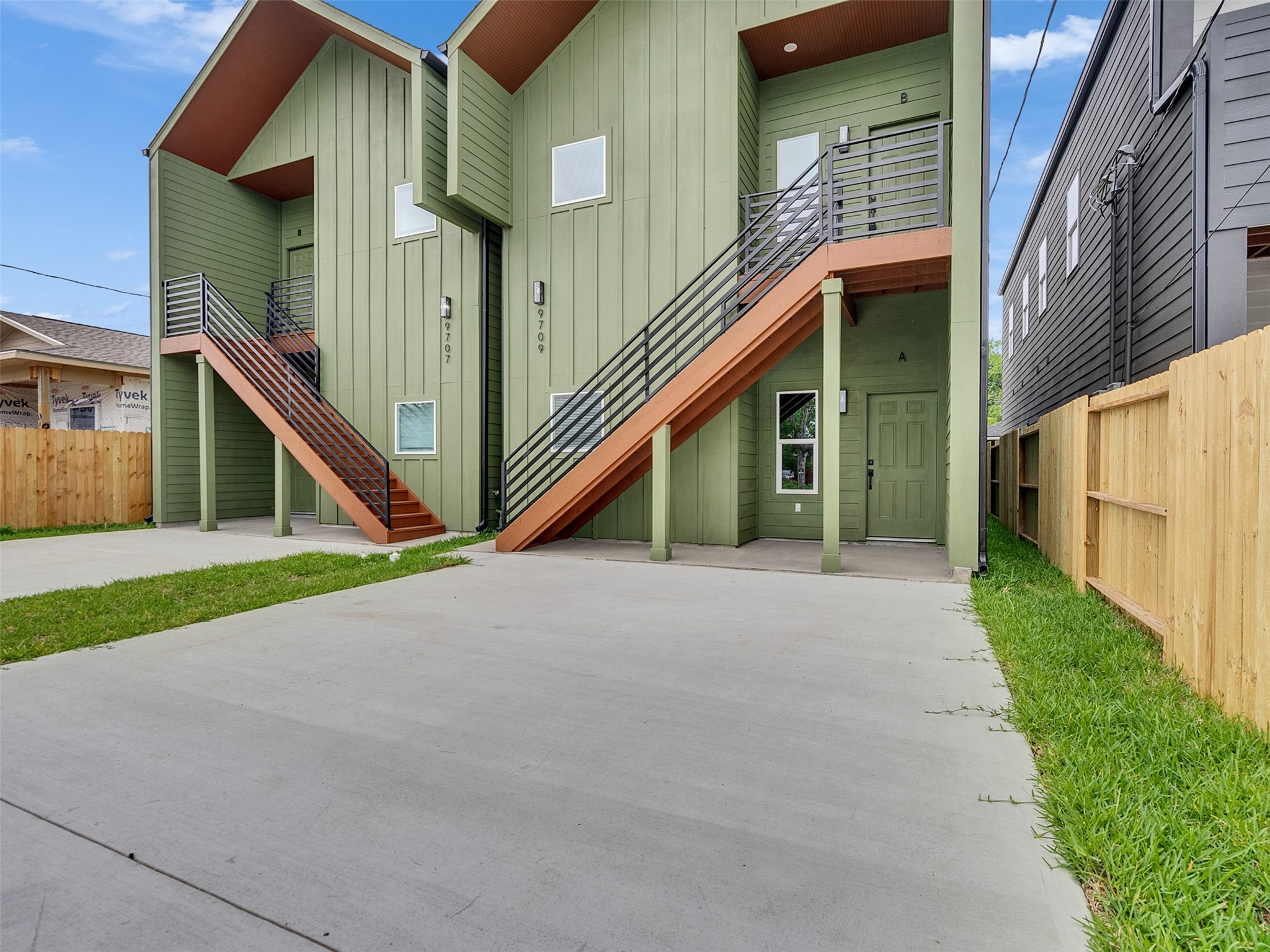 9707 Cargill Street, Unit AB Houston, TX 77029 - Photo 31 of 32 a view of a house with a yard