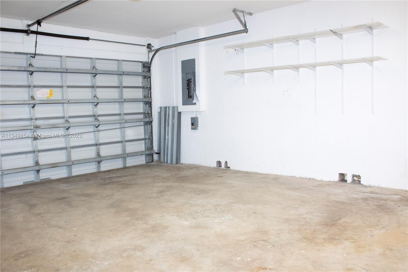 13221 Southwest 53rd Street Miramar, FL 33027 - Photo 31 of 32 a view of a garage