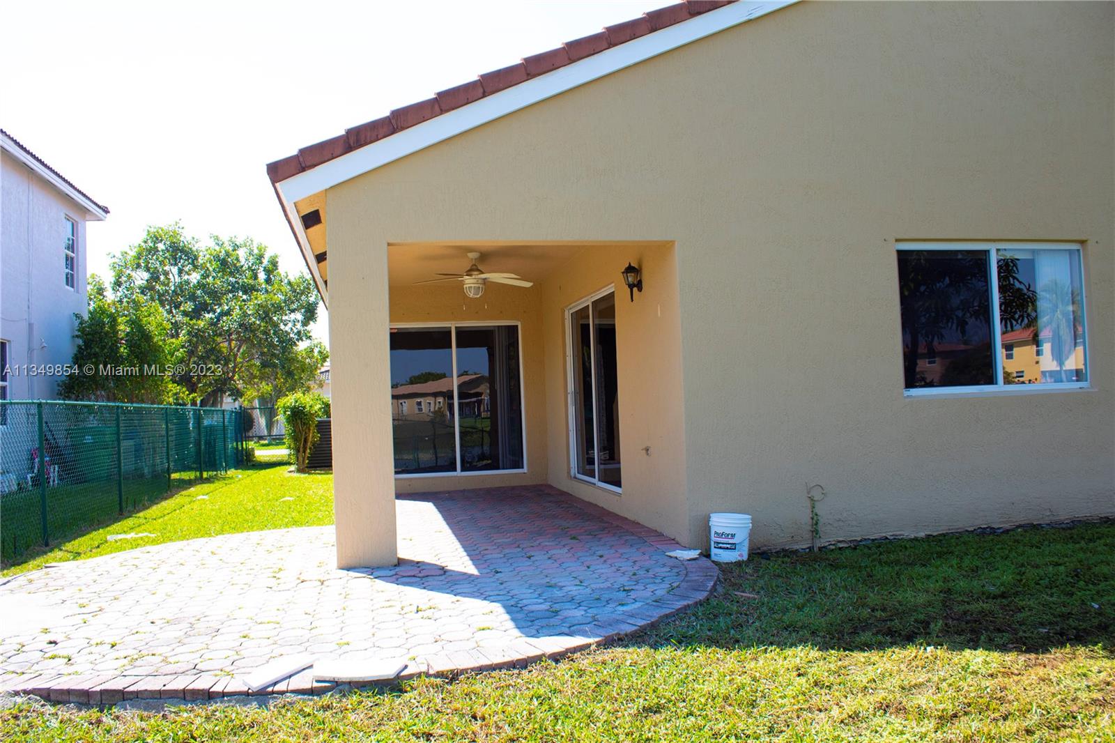 13221 Southwest 53rd Street Miramar, FL 33027 - Photo 4 of 32 a view of a house with a swimming pool