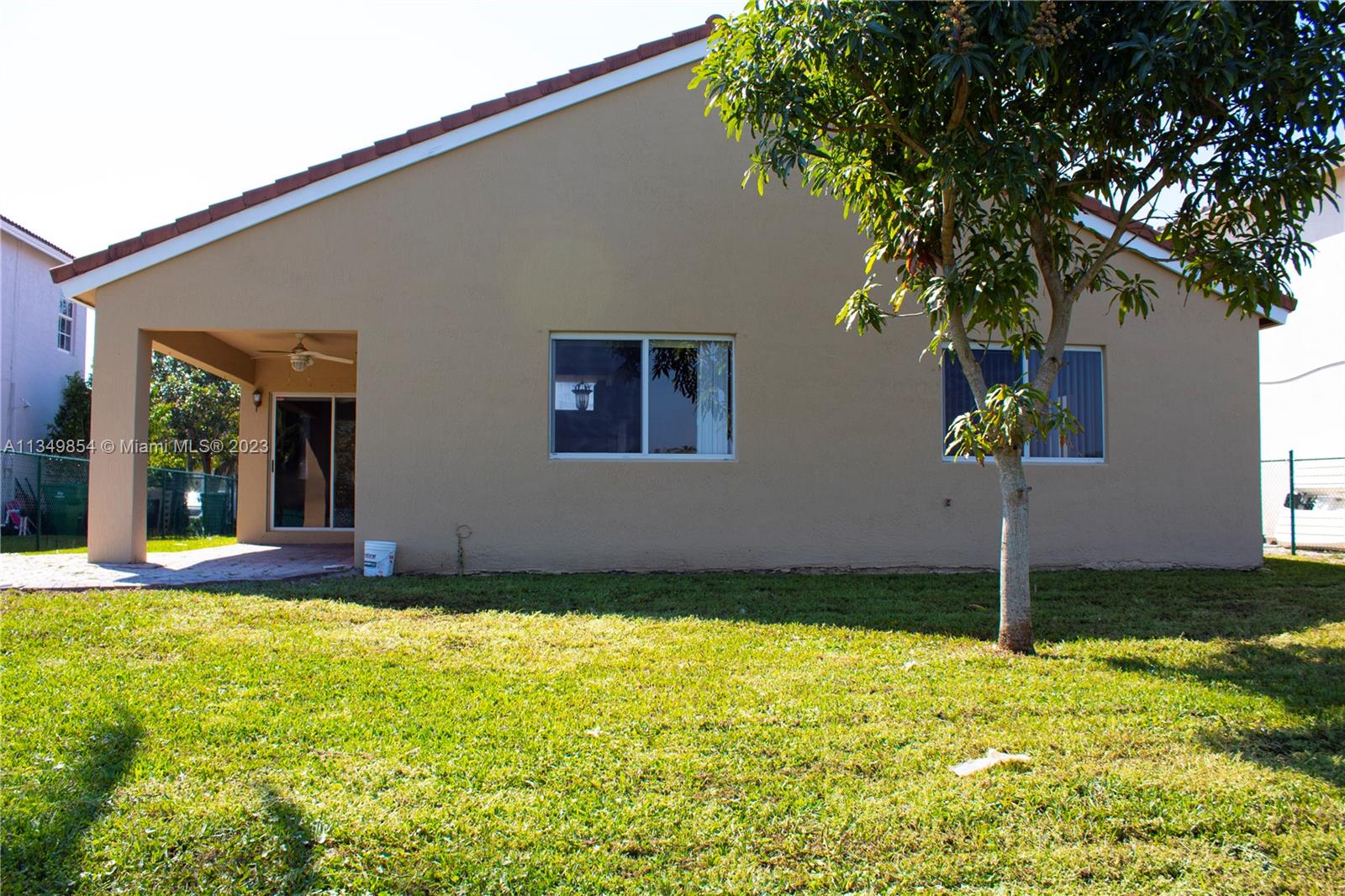 13221 Southwest 53rd Street Miramar, FL 33027 - Photo 6 of 32 a house view with a outdoor space