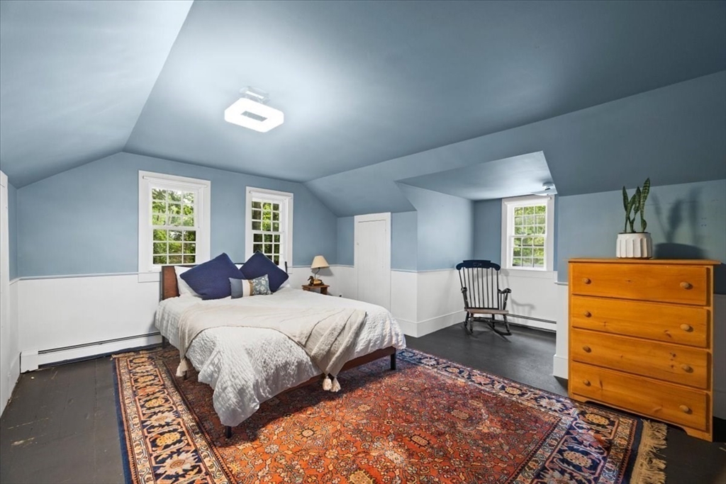 217 County Road Bourne, MA 02532 - Photo 23 of 30 a bedroom with a bed and a dresser
