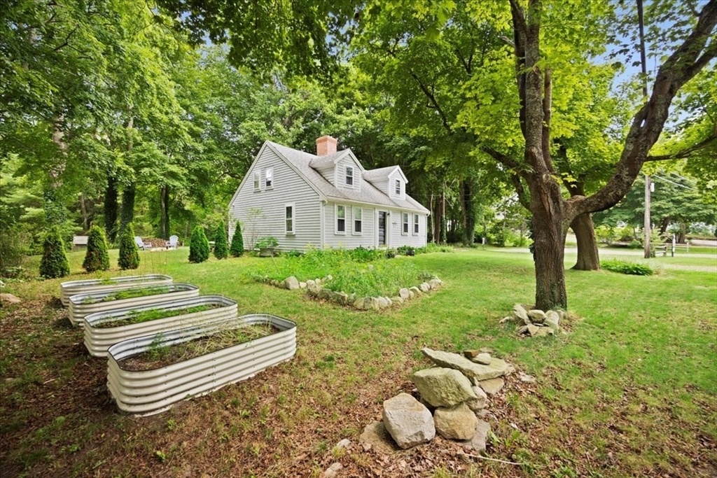 217 County Road Bourne, MA 02532 - Photo 27 of 30 a front view of a house with garden