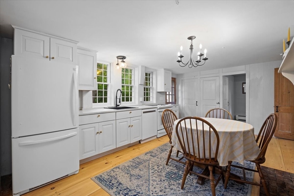 217 County Road Bourne, MA 02532 - Photo 7 of 30 a dining room with a table chairs and entryway