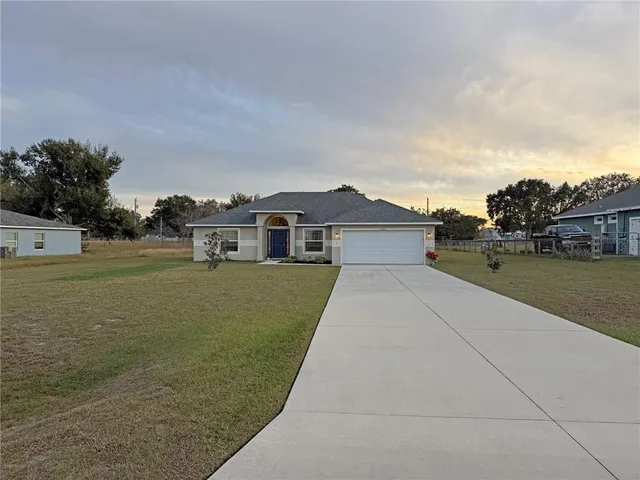 a view of house with outdoor space