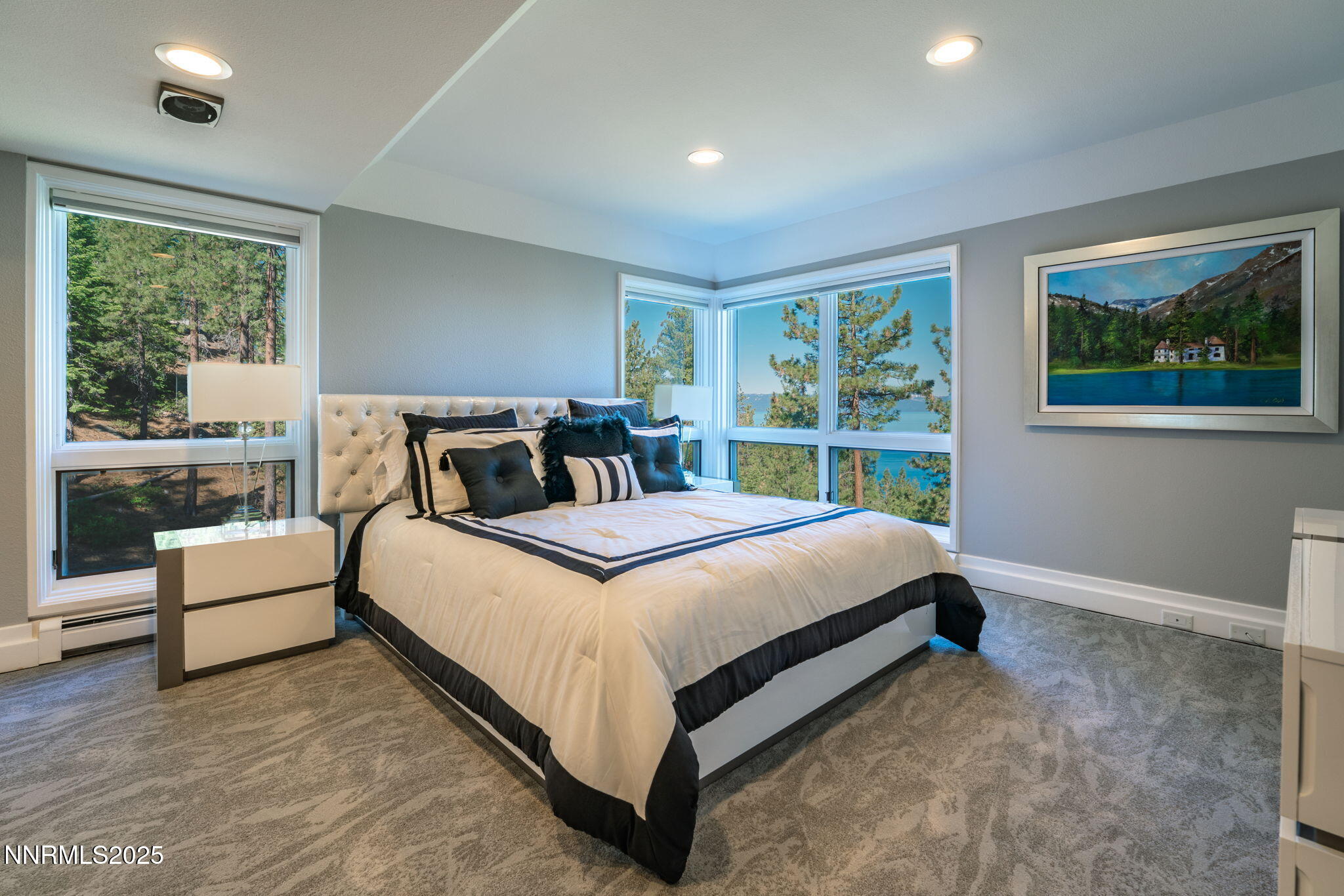 275 Chukkar Drive Glenbrook, NV 89413 - Photo 20 of 29 a bedroom with a large bed and a large window