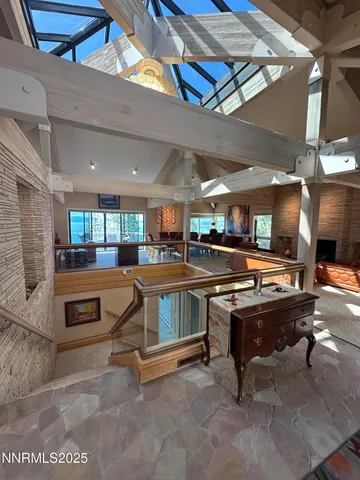 a room with gym equipment and a table