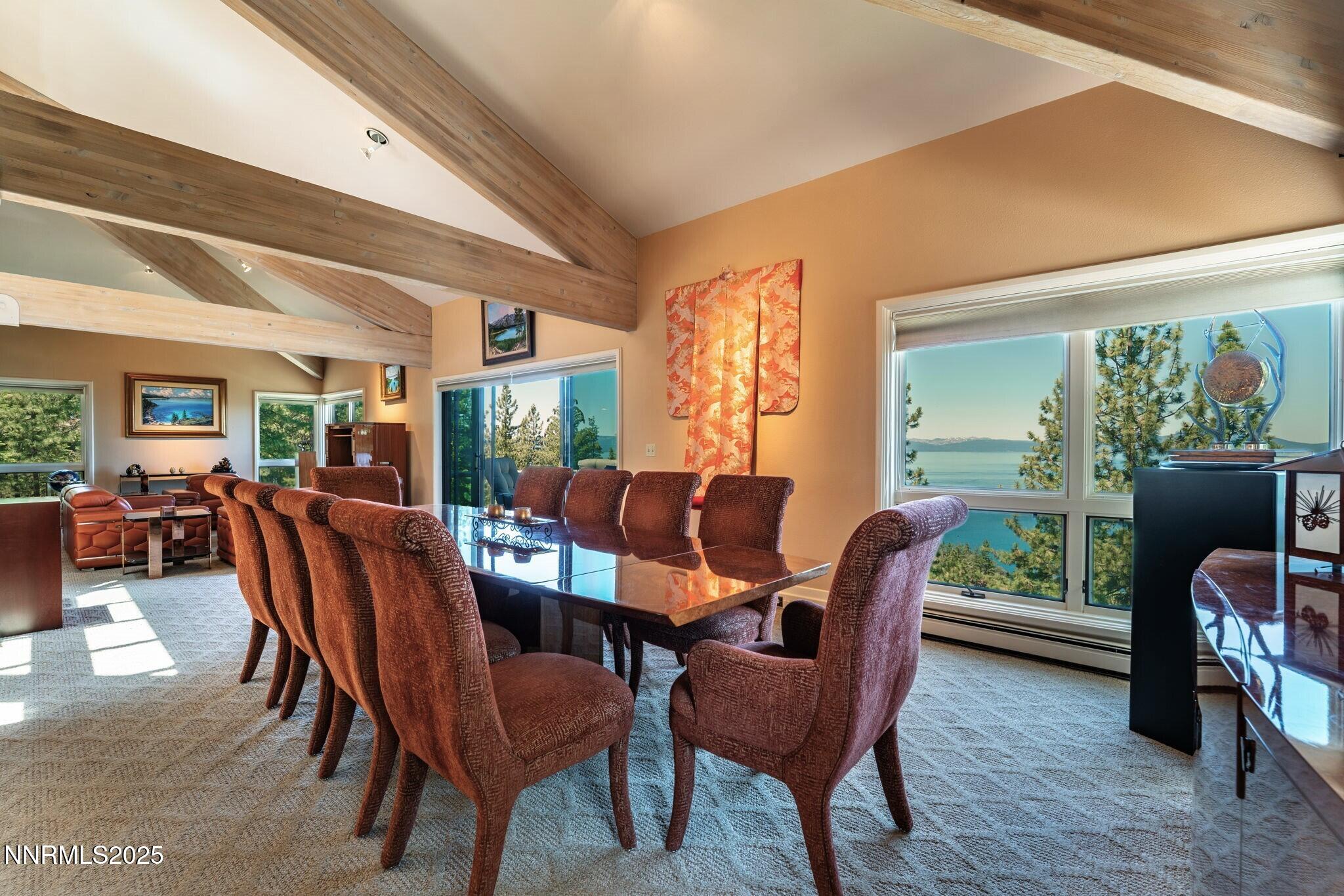 275 Chukkar Drive Glenbrook, NV 89413 - Photo 8 of 29 a dining room with furniture and a floor to ceiling window