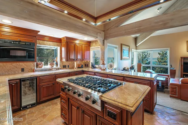 a kitchen with a stove and a sink