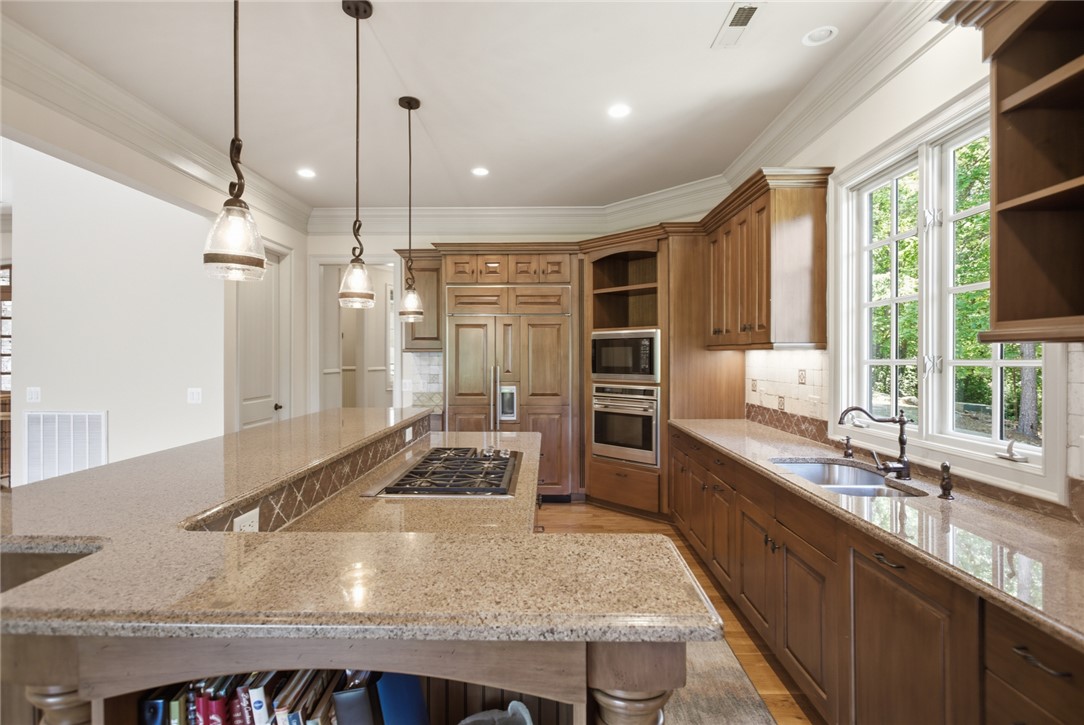 130 River Ridge Road Sunset, SC 29685 - Photo 10 of 47 This kitchen showcases ample workspace with extensive countertops and quality appliances, ideal for culinary pursuits.