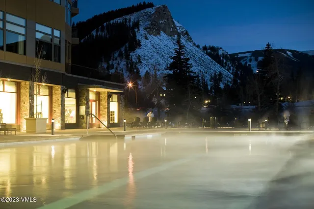 a view of pool with ocean view