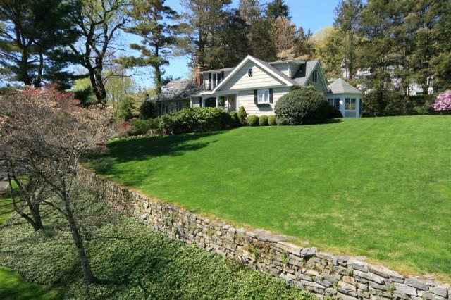 166 High Meadow Road Fairfield, CT 06890 - Photo 1 of 1 a front view of a house with yard