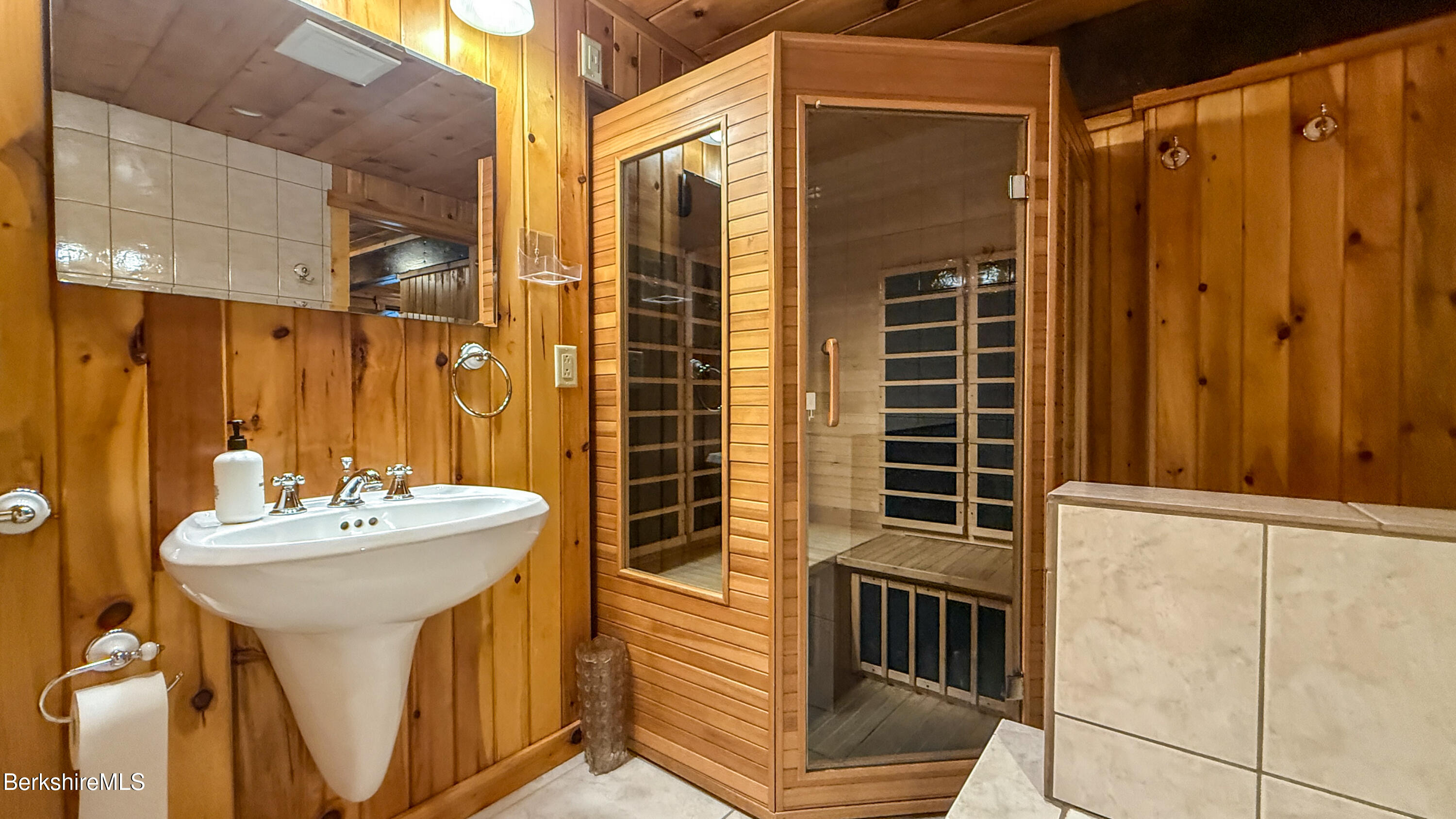 233 Algerie Road Becket, MA 01223 - Photo 40 of 48 a bathroom with a sink a mirror and shower