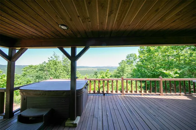 a view of porch with a swing
